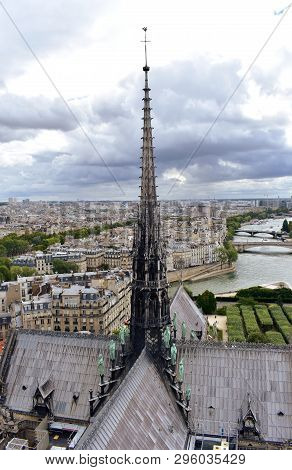 Notre Dame Spire, La Fleche, And Lead Clad Wooden Roofs Before The Fire. Cityscape With The Seine Ri