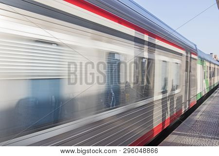 Railway Carriages At A Train Station Platfom In Urban City At Luxor Egypt With Motion Blur And Shado