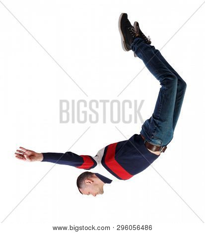 Side view of man in zero gravity or a fall. guy is flying, falling or floating in the air. Side view people collection.  side view of person.  Isolated over white. The guy in jeans falls down.
