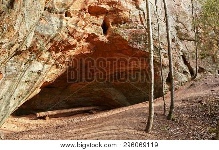Sandstone Rock In Spring In Latvia. Langu Cliffs At Lode Behind Cesis In Latvia.
