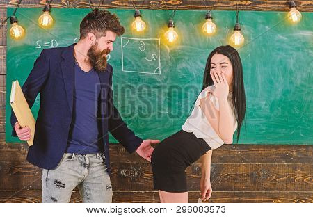 Schoolmaster Punishes Sexy Student With Slapping On Her Buttocks. Man With Beard Slapping Sexy Stude