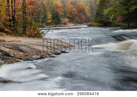 Small Rapids And Colorful Autumn Forest At Oxtongue River, Muskoka, Canada