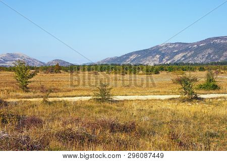Sunny Autumn Day In The Valley Of The Dinar Alps. Bosnia And Herzegovina, Republika Srpska, Zubacko 