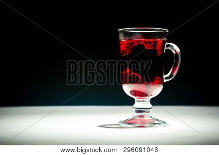 Transparent Glass Cup With Hot Red Tea From Hibiscus Or Hibiscus.