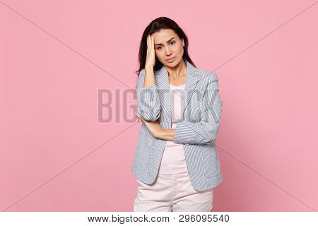Portrait Of Displeased Preoccupied Young Woman In Striped Jacket Putting Hand On Head Isolated On Pi