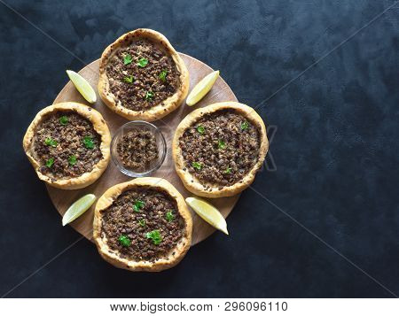 Traditional Lebanese Meat Pies On A Black Table. Top View.