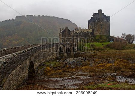 Eileen Donan Castle, Scotland, Uk On A Foggy Day In Autumn