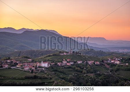 Small Village Kojsko With Chirch Križ On The Hill On Sunrise Between The Vineyards In The Wine Regio