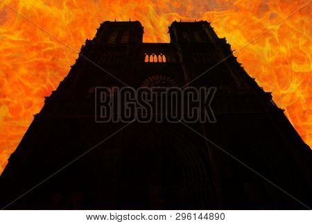 Backlit Silhouette Of The French Gothic Cathedral Of Notre Dame In Paris On Fire In France In April 