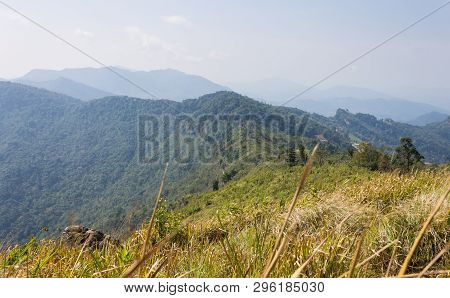 Phu Chi Fa Forest Park With Grass Field Green Mountain Sky And Cloud. Phu Chi Fa Forest Park View Po