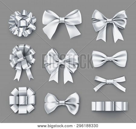 Pretty White Gift Bows With Ribbons. Wedding Ceremony Decor Isolated On Grey Background. Realistic D