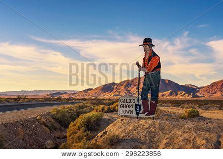 Yermo, California, Usa - October 25, 2018 : Sign Of Old Miner With Multiple Bullet Holes Located Alo