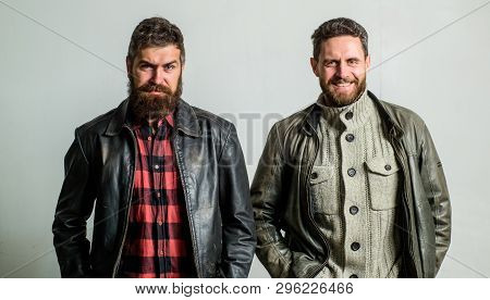 Bully Team. Brutal Men Wear Leather Jackets. Men Brutal Bearded Hipster. Handsome Stylish And Cool. 