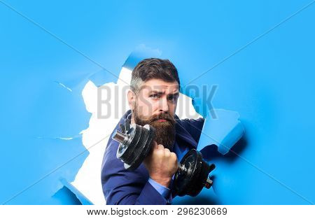 Through Paper. Bearded Man With Dumbbell Looking Through Paper Hole. Power. Strength. Bearded Man Th