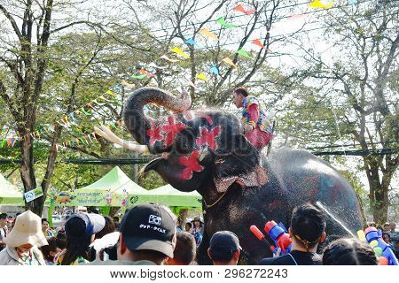Ayutthaya Thailand April 14, 2019 : Elephant Splashing Water Between Tourist In Songkarn Festival