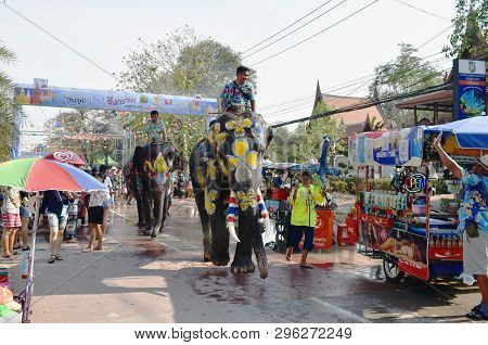 Ayutthaya Thailand April 14, 2019 : Elephant Splashing Water Between Tourist In Songkarn Festival