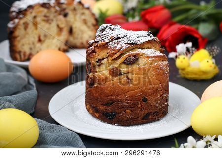 Easter Cake Craffin And Colorful Eggs On A Dark Background