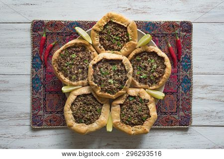 Beef Mince Sfiha - Arabian Opened Meat Pies On White Wood Background.
