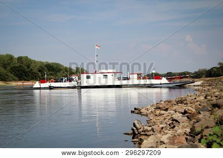 A Ferry Crosses The Elbe With Cars