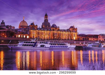 Wonderful Cityscape, The Old Town Of Dresden With The River Elbe After Sunset With Colorful Sky. Eve
