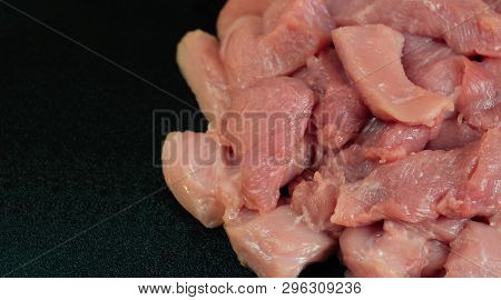 Meat On Blackboard. Sliced Pork. Minced Fillet Of Red Meat. Billets For Barbecue Or Kebab. Cut Meat.