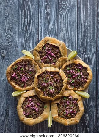 Open Meat Pies On Dark Wooden Background. Top View.