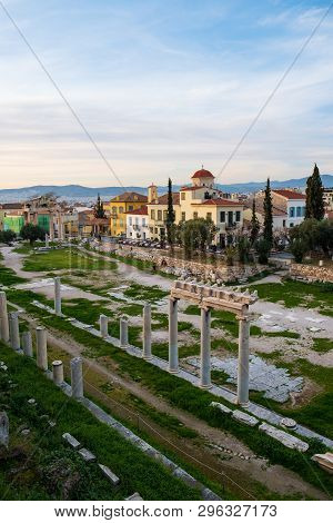 Remains Of The Roman Agora And Cityscape Of  Athens, Greece On A Spring Afternoon
