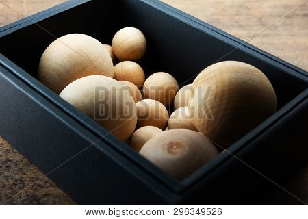 The elements. Concept of required or necessary elements in a box.  Multiple Spheres enclosed in a single box.