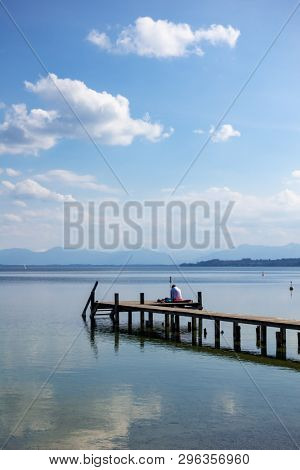 An image of a nice wooden jetty at Starnberg lake