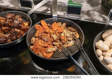 Grilled Eryngi Mushroom And Carrot In Fry Pan. Detail Of Buffet Served In Line At Hotel For Service.