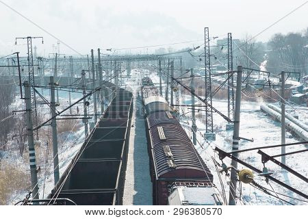 Rail Cars Loaded With Coal Being Transported From Nearby Mines To Power Plants In Winter