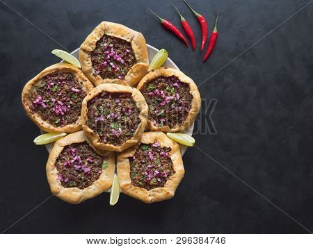 Open Meat Pies On A Black Background. Top View