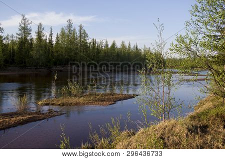 North River Flowing Across Green Forest. Spring. Before The Rain