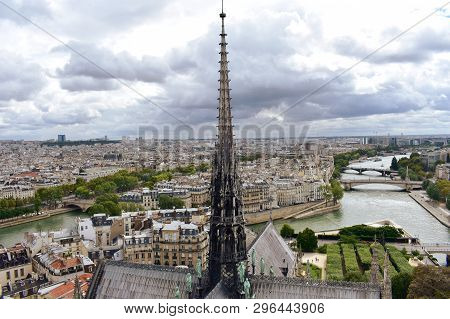 Notre Dame Spire, La Fleche, And Lead Clad Wooden Roofs Before The Fire. Cityscape With The Seine Ri
