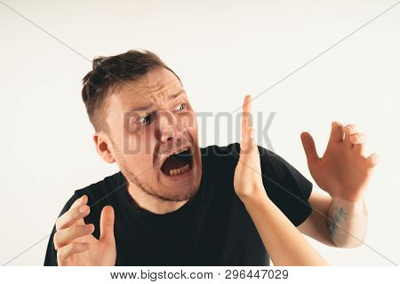 Crop Person Slapping Scared Man In Face
Emotional Male Getting Slapped In Face While Shouting With C