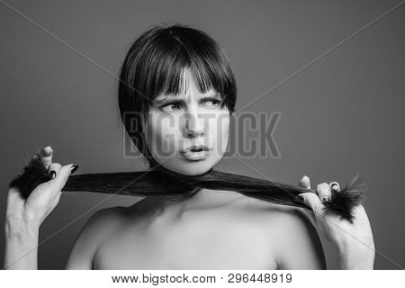 Furious Pretty Woman. Unfriendly Facial Expression. Black And White Closeup Portrait Of Emotional La