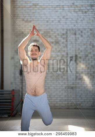 An Athletic Man On Capoeira Training. Raising Hand Up