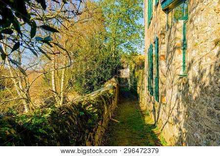 Dirt Alley In The Medieval Town Of Domfront, Normandy France