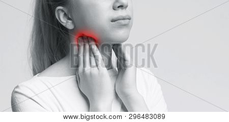 Young Woman Suffering From Tonsillitis, Pulping Her Neck, Monochrome Panorama Photo, Free Space
