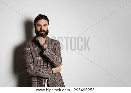 Casual Dreesed Handsome Cheerful Man Standing Over White Background And Looking Camera. Mockup Copy 