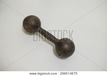 Very Old Rusty Heavy 17 Pound Iron Dumbbell On Isolated Background
