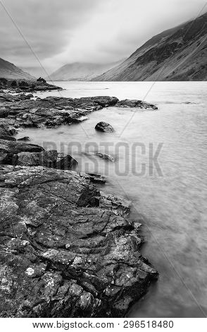 Beautiful Long Exposure Landscape Image Of Wast Water In Uk Lake District During Moody Spring Evenin