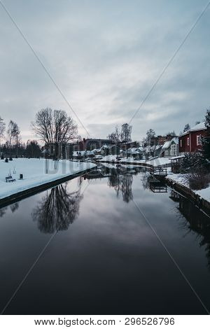 Winter Morning By The River In Forssa Finland With Calm Water