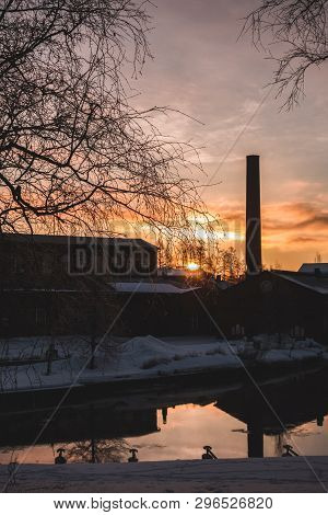 Winter Morning With Sunrise At The Old Spinning Mill By The River In Forssa Finland
