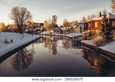 Cold Winter Morning By The River In Forssa Finland With Calm Water