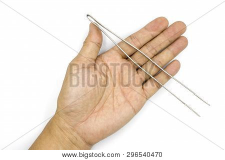 A Male Hand Holding Tweezers, Medical Pinsetter, Man Hand  Isolated On White Background