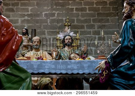 Avila, Spain - April 17, 2019. The Last Supper,  religious images of the Holy Week footsteps inside the Cathedral of Ãvila, Spain
