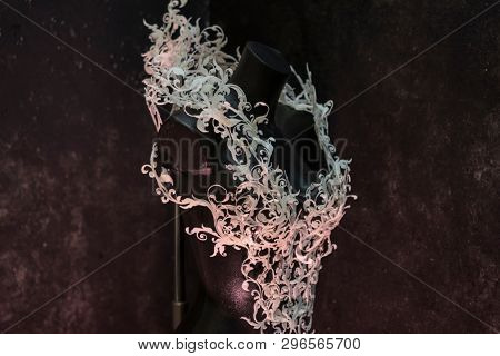 Piece made with 3d printer, is composed of white flowers that form a corset, handmade, fantasy design Baroque style