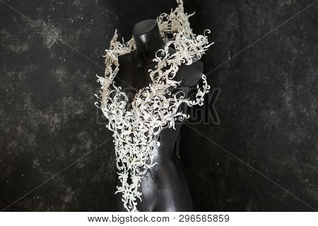Piece made with 3d printer, is composed of white flowers that form a corset, handmade, fantasy design Baroque style