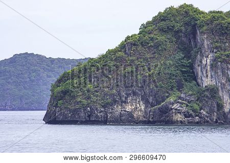 Wooden Houses Built On Rocks In The Koh Maphrao At Chumphon In Thailand.